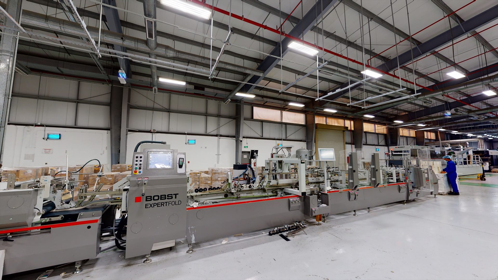 Folding and gluing line on the JP&P production floor